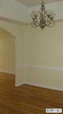 3323 Neal Boyce Road Monroe, NC 28110 - Photo 3 of 8 a view of a small space with wooden floor