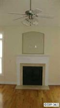 3323 Neal Boyce Road Monroe, NC 28110 - Photo 4 of 8 a close view of a fireplace