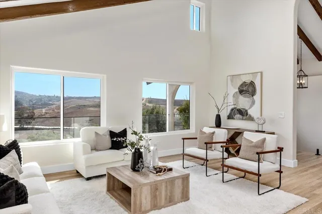 a view of a living room and dining room