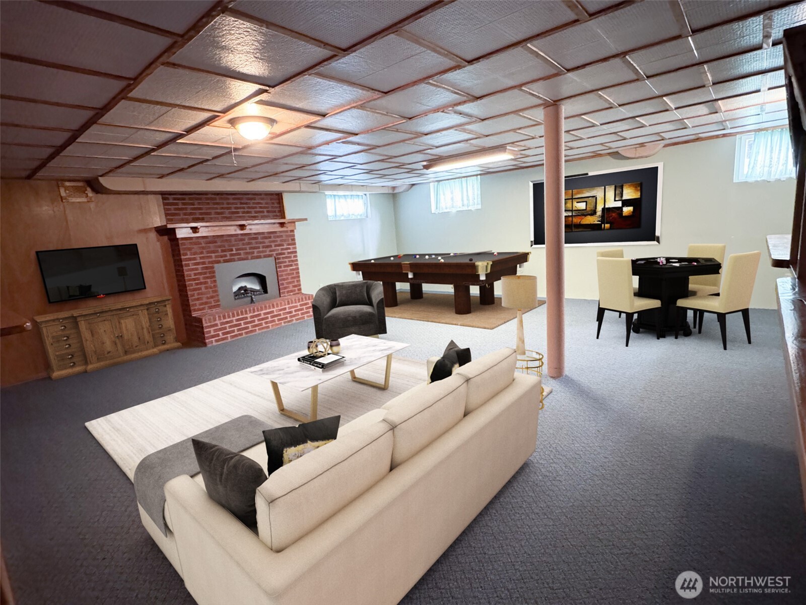 126 West 6th Street Port Angeles, WA 98362 - Photo 18 of 40 a living room with furniture and a flat screen tv