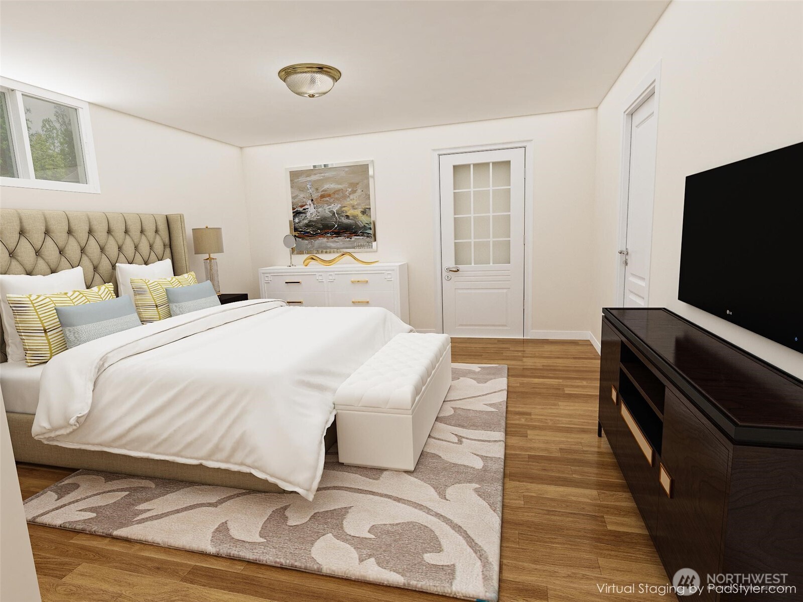 126 West 6th Street Port Angeles, WA 98362 - Photo 20 of 40 a bedroom with a bed and a flat screen tv