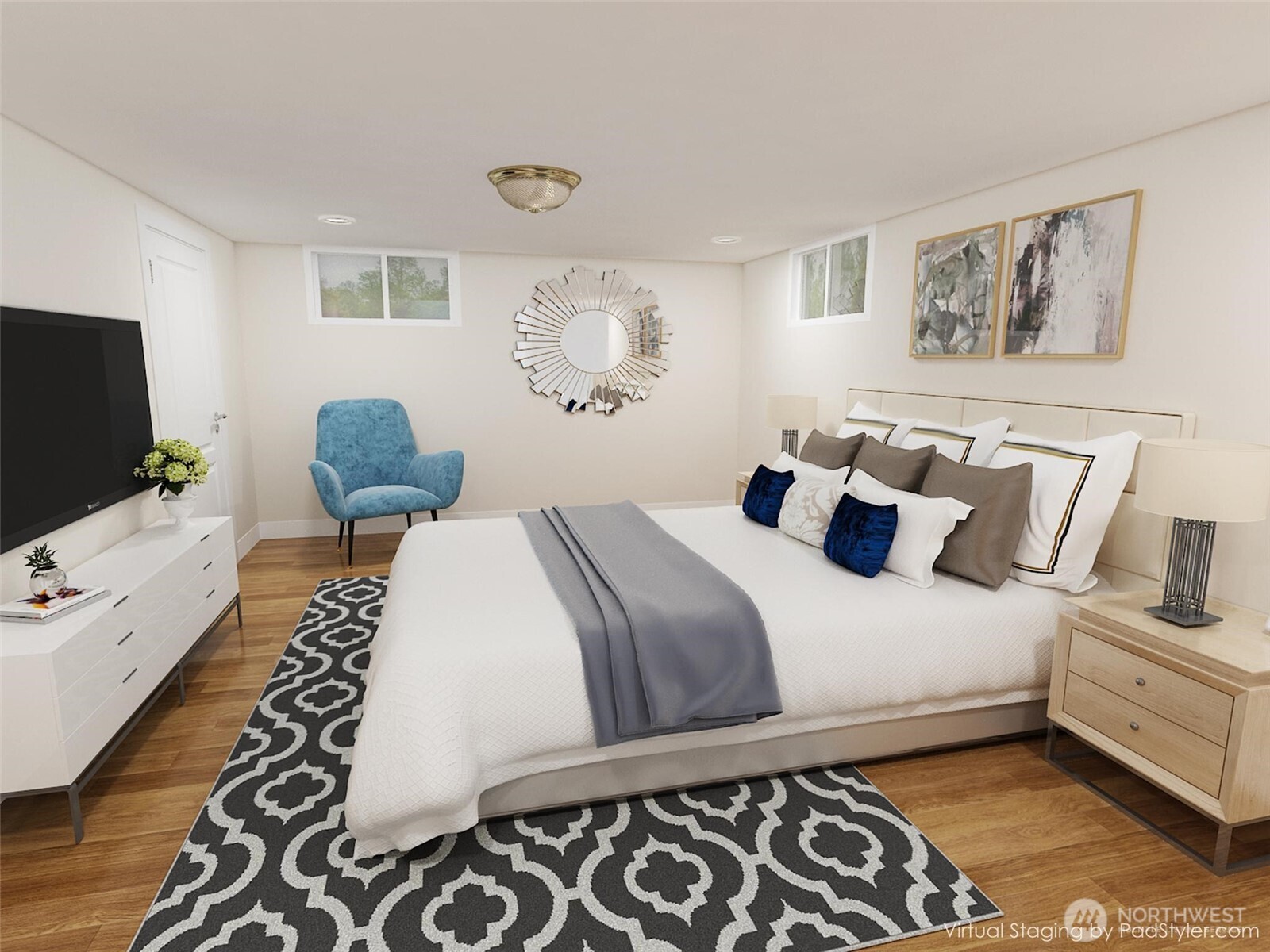 126 West 6th Street Port Angeles, WA 98362 - Photo 25 of 40 a bedroom with a large bed and a flat screen tv