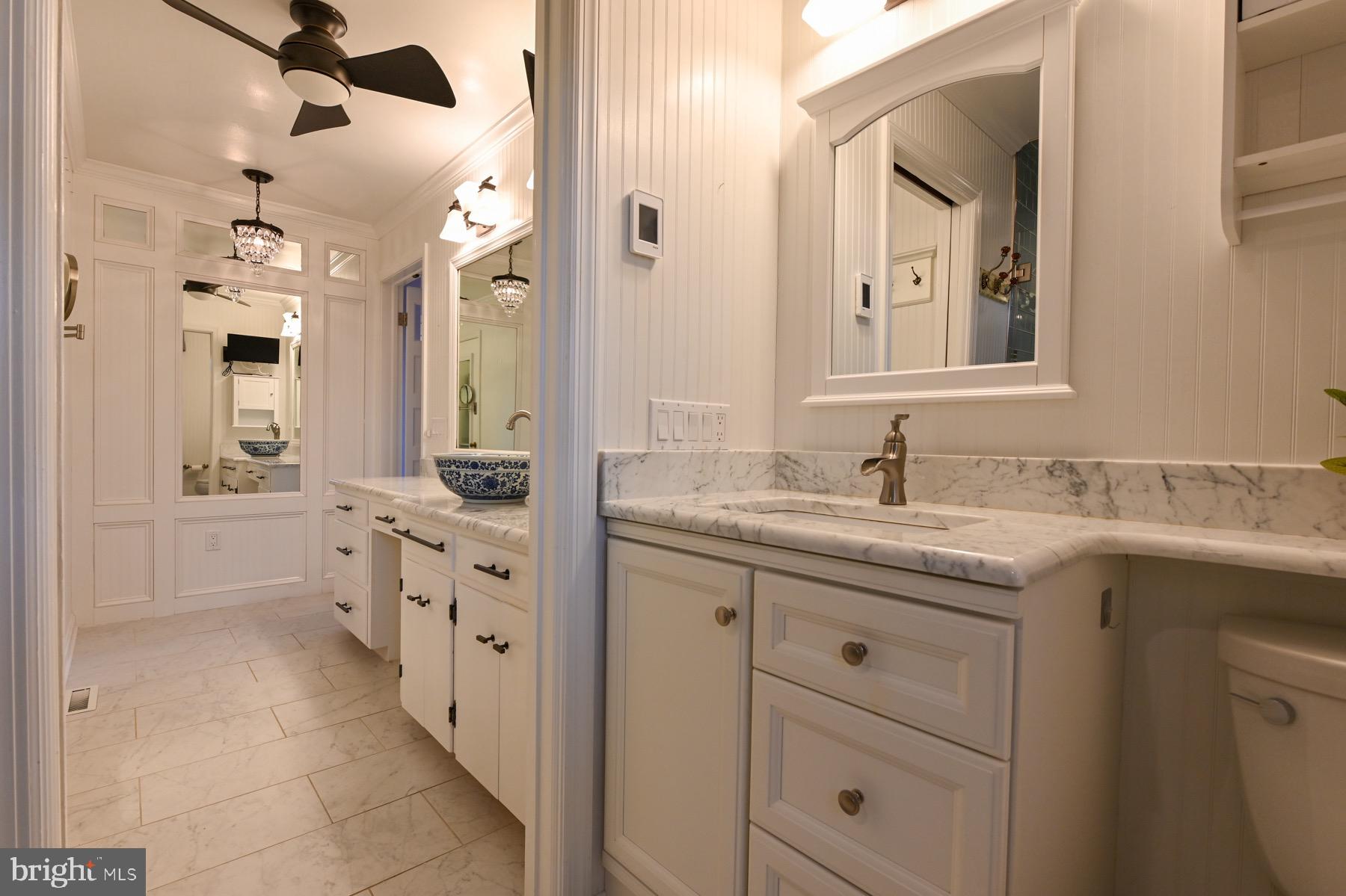 2907 Lawndale Road Finksburg, MD 21048 - Photo 35 of 75 a spacious bathroom with a granite countertop sink mirror and