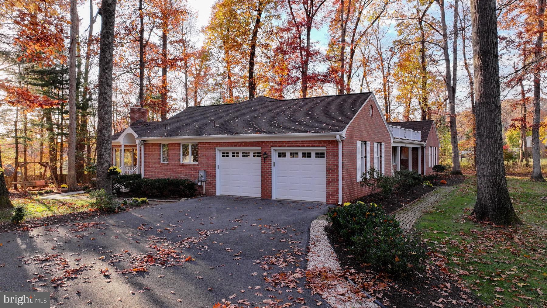 2907 Lawndale Road Finksburg, MD 21048 - Photo 71 of 75 a front view of a house with a garden and tree