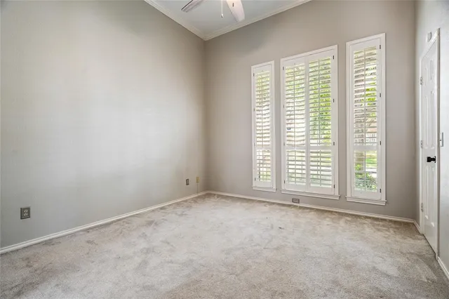 a spacious bathroom with a double vanity sink mirror and bathtub