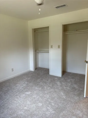an empty room with closet
