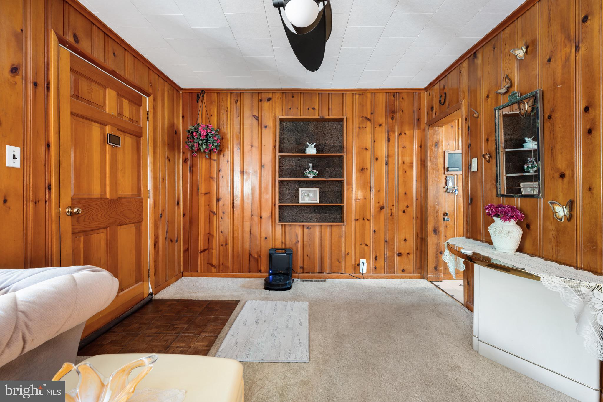 302 Tyler Avenue Carneys Point, NJ 08069 - Photo 7 of 27 a bedroom with a bed and wooden floor