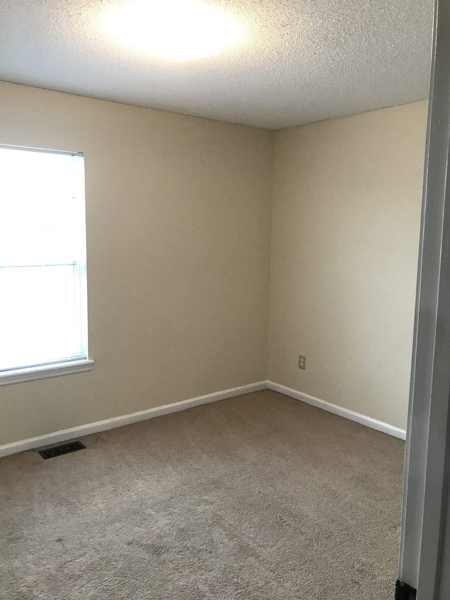 200 Rusty Drive Oak Grove, KY 42262 - Photo 4 of 8 an empty room with a window