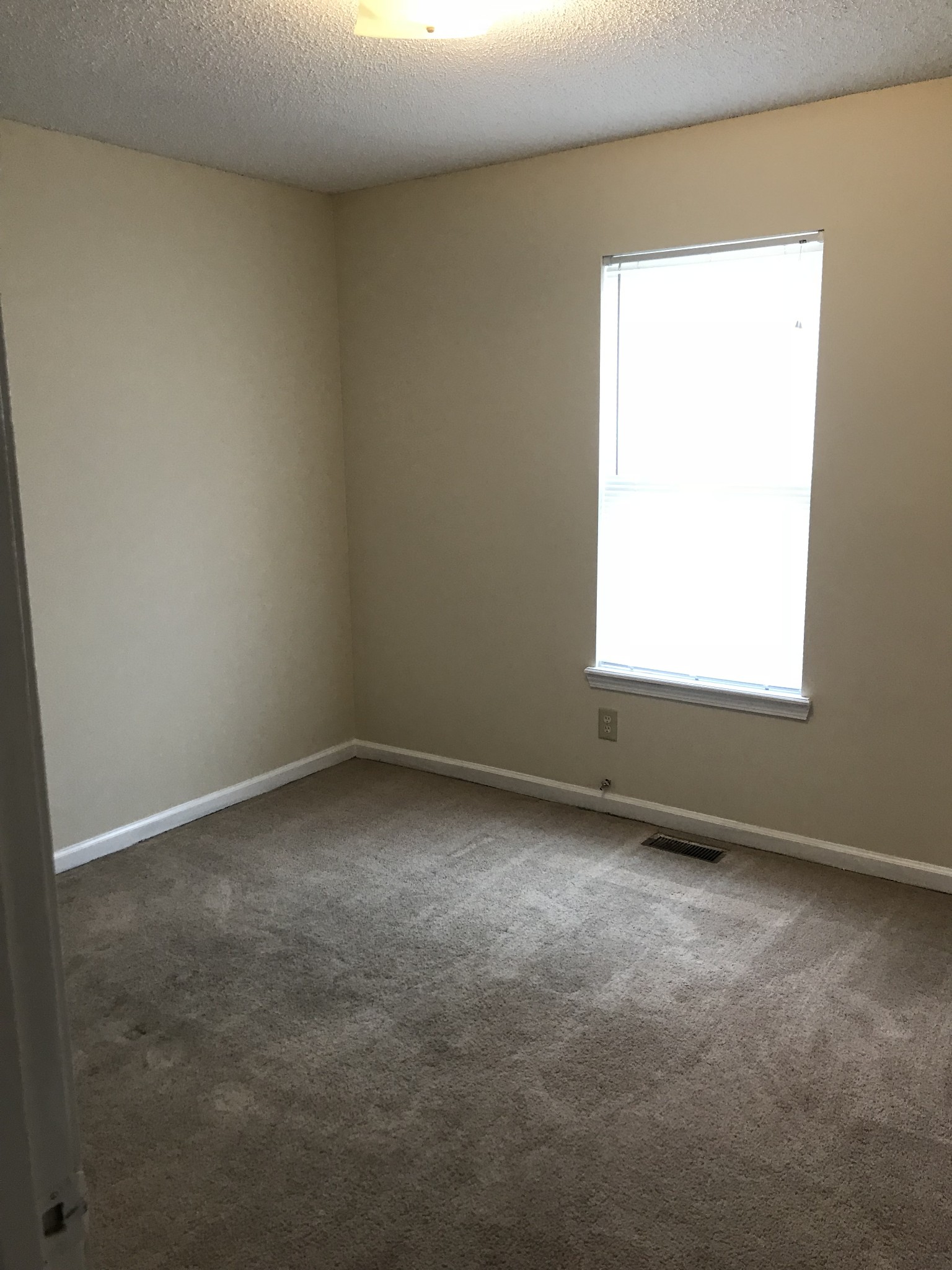 200 Rusty Drive Oak Grove, KY 42262 - Photo 5 of 8 an empty room with a window