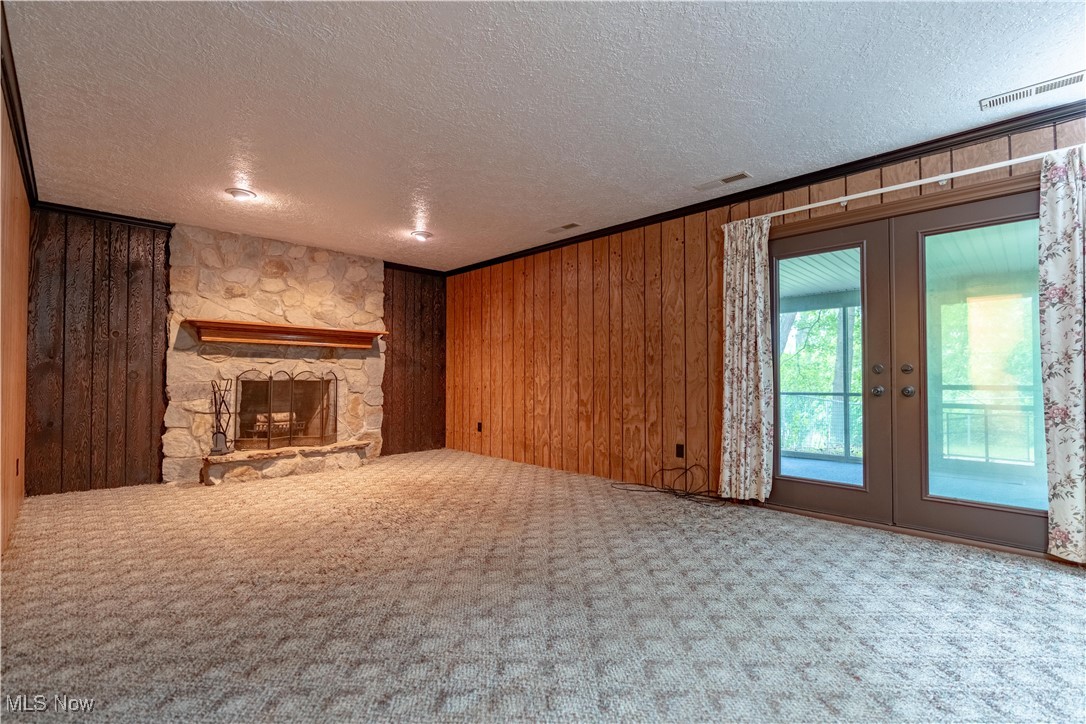 5535 Veldon Circle Northeast Canton, OH 44721 - Photo 28 of 41 Large family room that opens to the screened in porch.