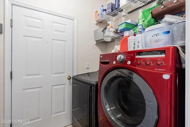 a view of entryway with wooden floor and stairs