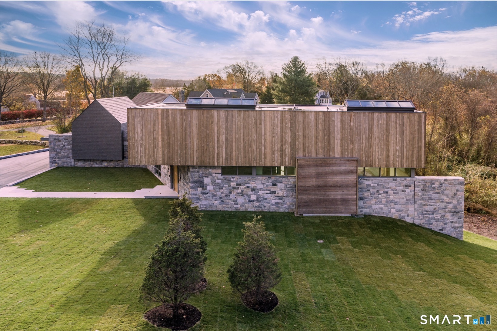 314 Ferry Road Old Lyme, CT 06371 - Photo 39 of 40 Greystone was built using a recognizable New England palette of materials such as wood and slate.