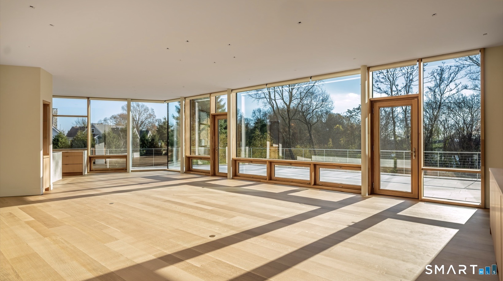 314 Ferry Road Old Lyme, CT 06371 - Photo 40 of 40 The main level Greystone features an open floorplan: living room, dining room, and kitchen space. There is also a separate den, office, half bath, laundry room, and primary bedroom suite.