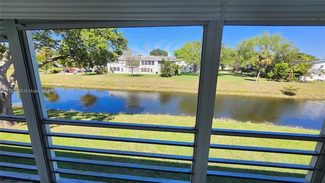 a view of swimming pool from a window