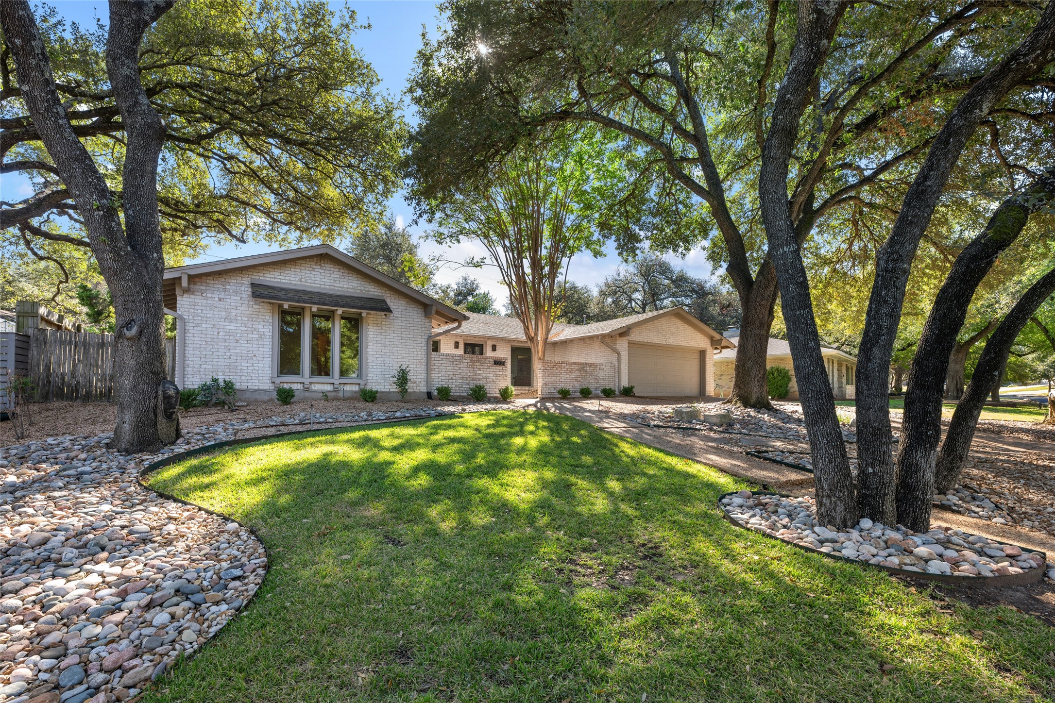 Rare single story in Northwest Hills with 4 bedrooms, 3 full bathrooms, 2 living, & 2 dining, on a fantastic street