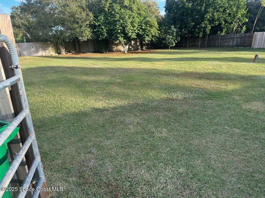 6775 Buxton Avenue Cocoa, FL 32927 - Photo 2 of 2 a view of a tennis court