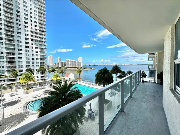a view of balcony with furniture