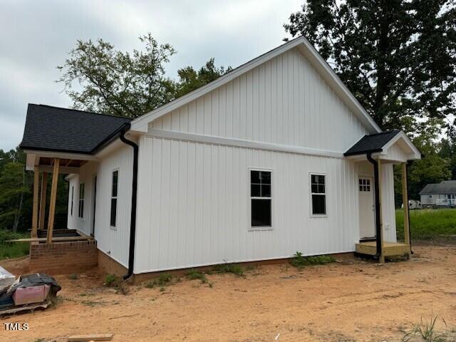 144 Squirrel Path Way Roxboro, NC 27574 - Photo 3 of 9 a view of a house with a yard