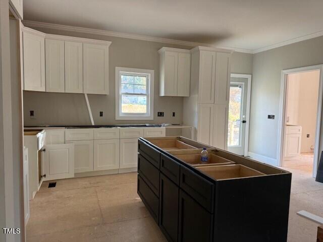 144 Squirrel Path Way Roxboro, NC 27574 - Photo 7 of 9 a kitchen with a sink stove and cabinets