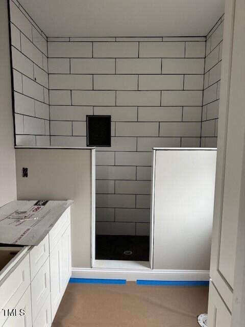 144 Squirrel Path Way Roxboro, NC 27574 - Photo 8 of 9 a bathroom with a sink and a shower