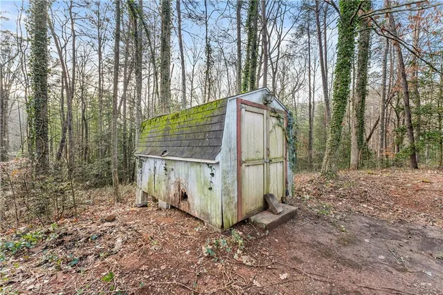 a view of a yard with trees