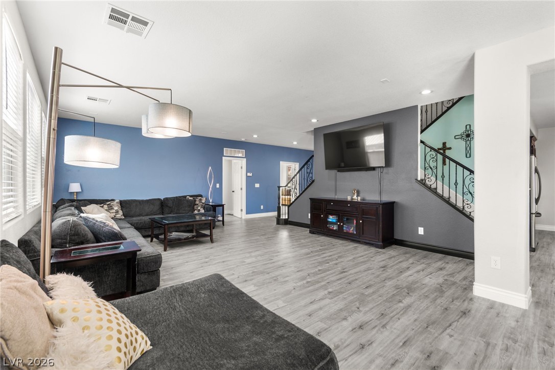 5601 Rocky Ravine Avenue Las Vegas, NV 89131 - Photo 17 of 71 Living area featuring light wood-type flooring and recessed lighting
