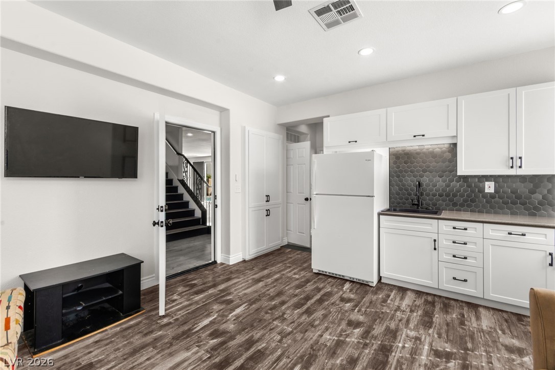 5601 Rocky Ravine Avenue Las Vegas, NV 89131 - Photo 28 of 71 Down stairs Next-Gen Suite With Living Room & Kitchenette