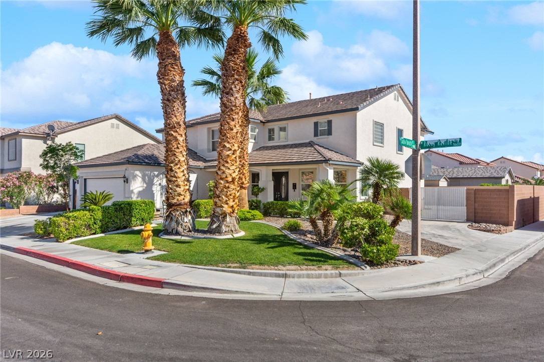 5601 Rocky Ravine Avenue Las Vegas, NV 89131 - Photo 6 of 71 Side View Of Yard, RV Driveway & RV Gate