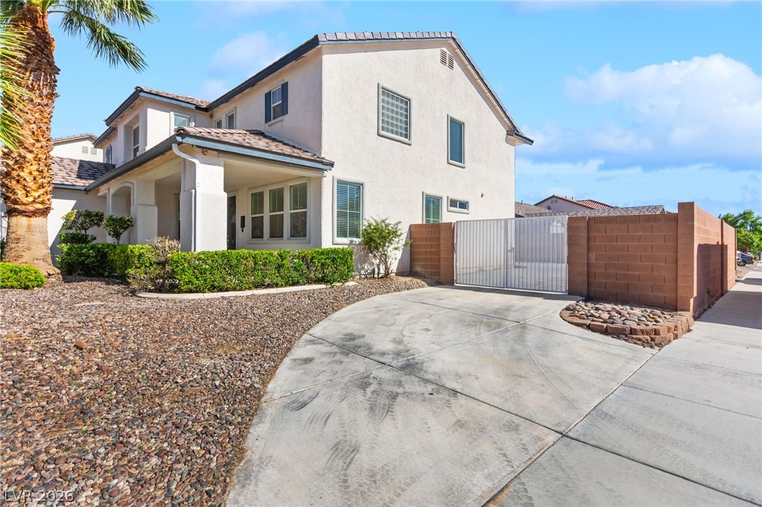 5601 Rocky Ravine Avenue Las Vegas, NV 89131 - Photo 7 of 71 RV Driveway & Gate