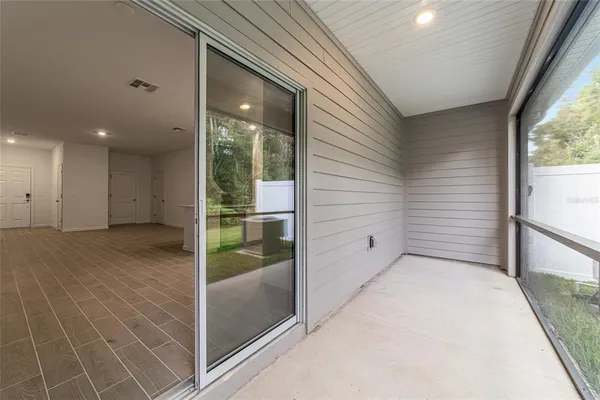a view of a house with a yard and garage