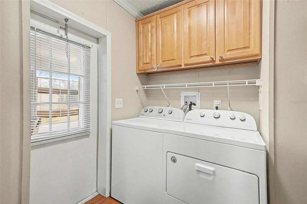 11305 Pineapple Road Punta Gorda, FL 33955 - Photo 19 of 30 a utility room with dryer and washer