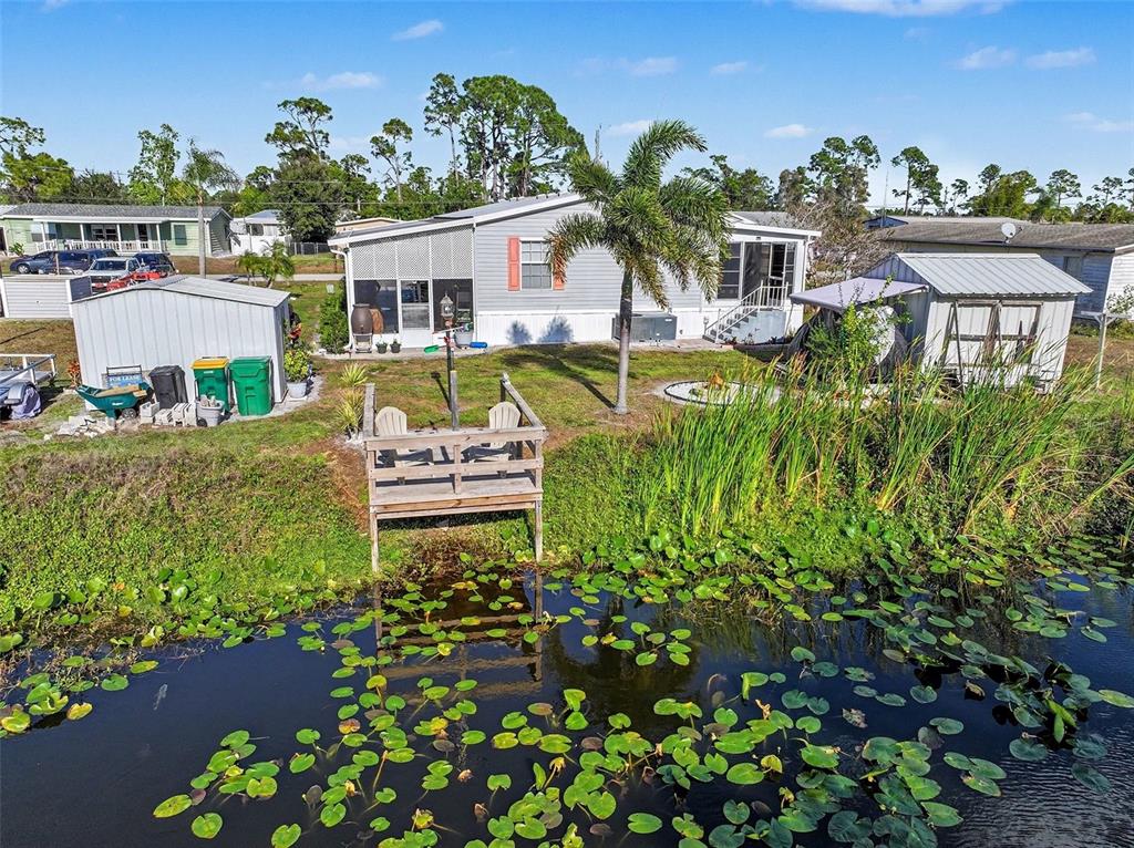 11305 Pineapple Road Punta Gorda, FL 33955 - Photo 26 of 30 an aerial view of a house with a garden and plants