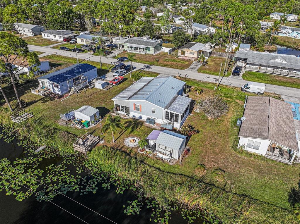 11305 Pineapple Road Punta Gorda, FL 33955 - Photo 28 of 30 an aerial view of a swimming pool with outdoor seating
