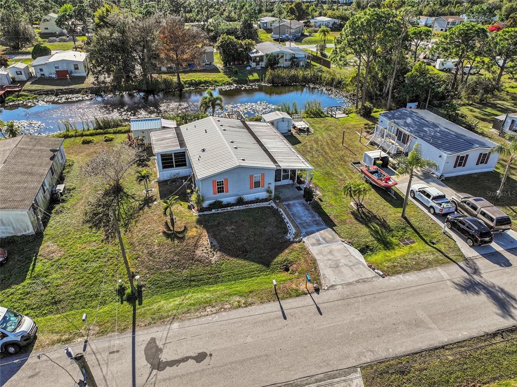 11305 Pineapple Road Punta Gorda, FL 33955 - Photo 29 of 30 an aerial view of residential houses with outdoor space