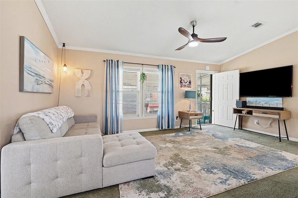 11305 Pineapple Road Punta Gorda, FL 33955 - Photo 5 of 30 a living room with furniture and a flat screen tv