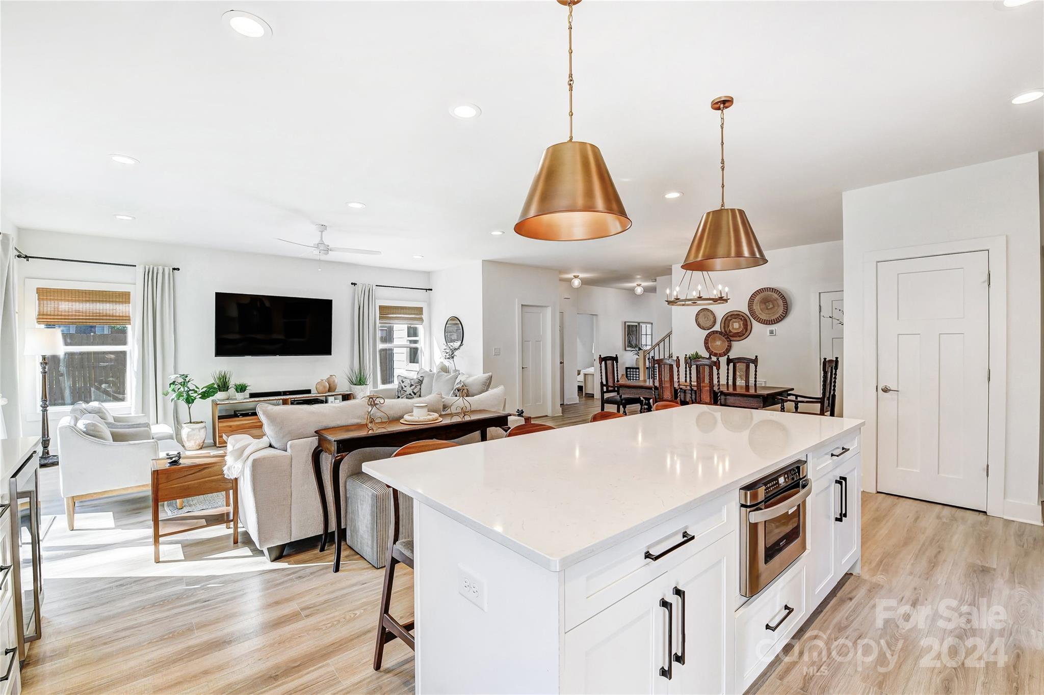 526 Seldon Drive Charlotte, NC 28216 - Photo 12 of 46 a large kitchen with a table and chairs