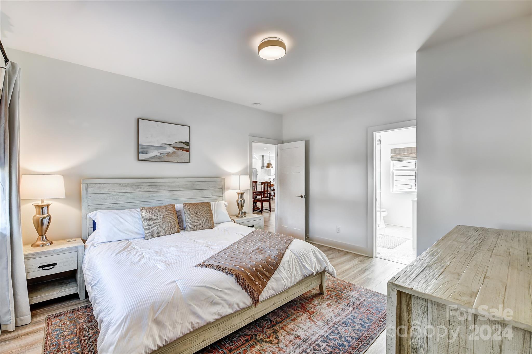 526 Seldon Drive Charlotte, NC 28216 - Photo 18 of 46 a bedroom with a bed and a couch