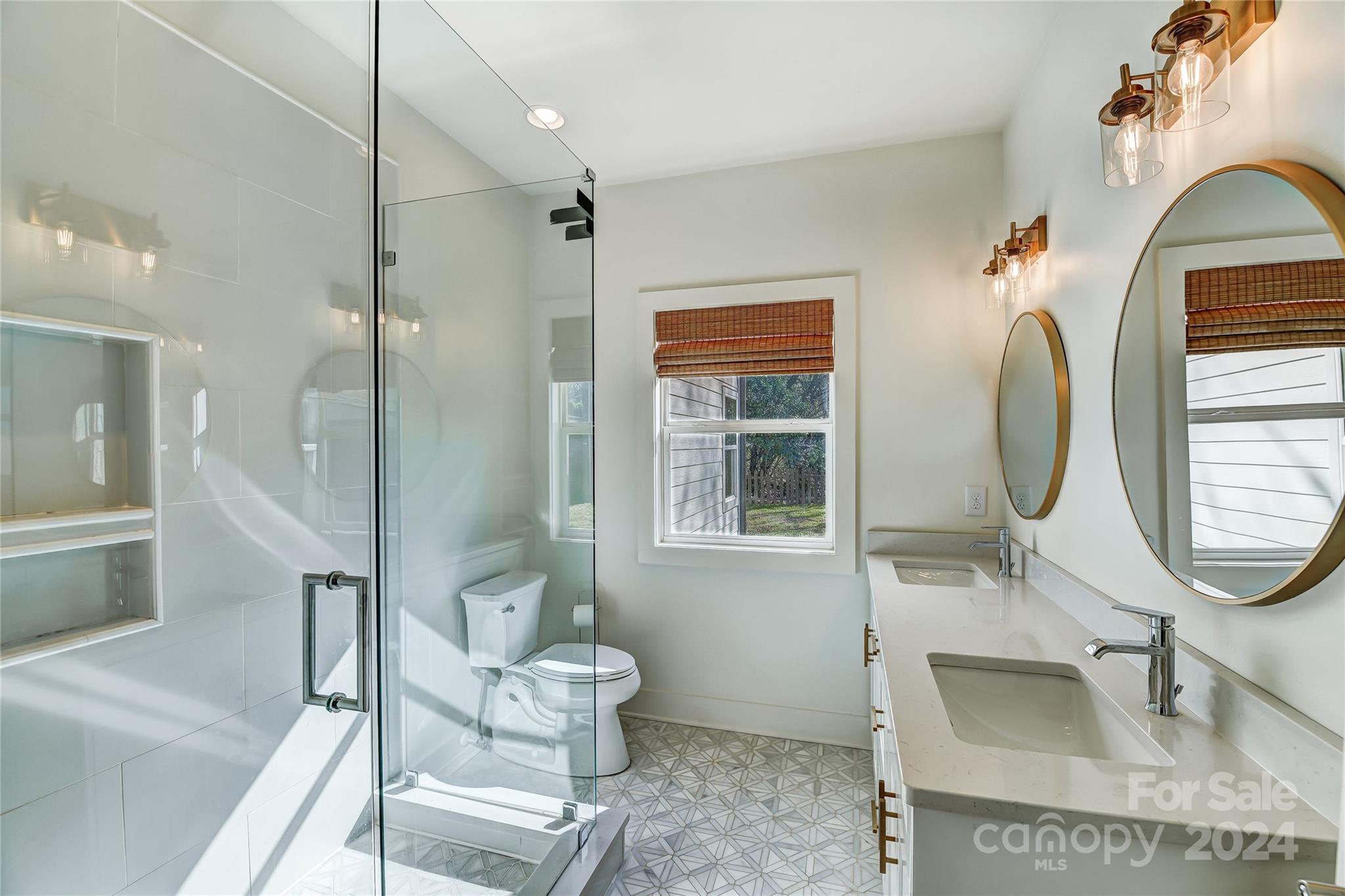 526 Seldon Drive Charlotte, NC 28216 - Photo 20 of 46 a bathroom with a sink and a mirror