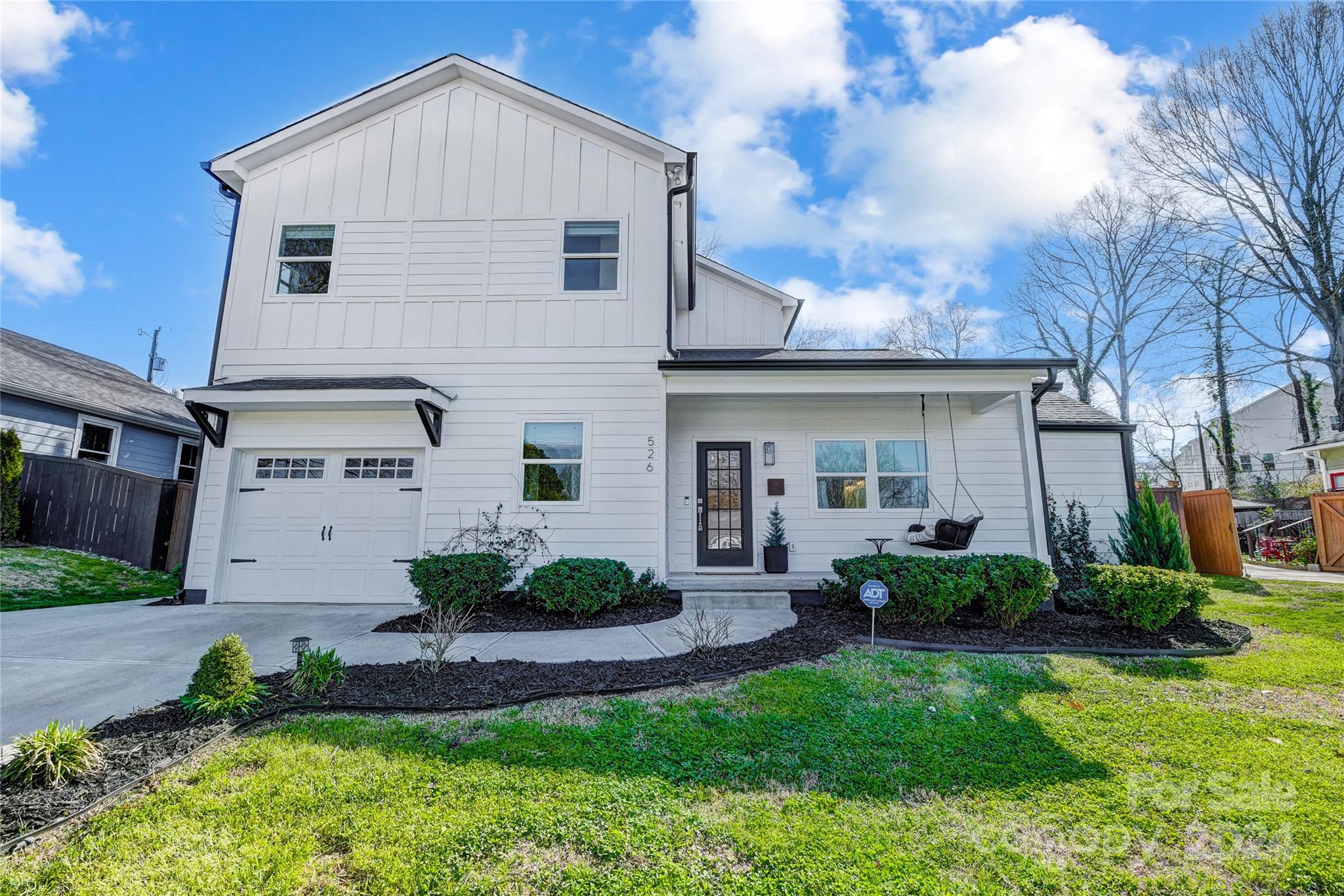526 Seldon Drive Charlotte, NC 28216 - Photo 2 of 46 a view of a house with a yard and plants