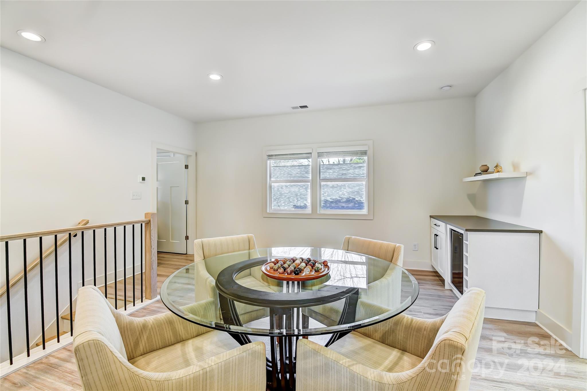 526 Seldon Drive Charlotte, NC 28216 - Photo 28 of 46 a view of a dining room with furniture and wooden floor
