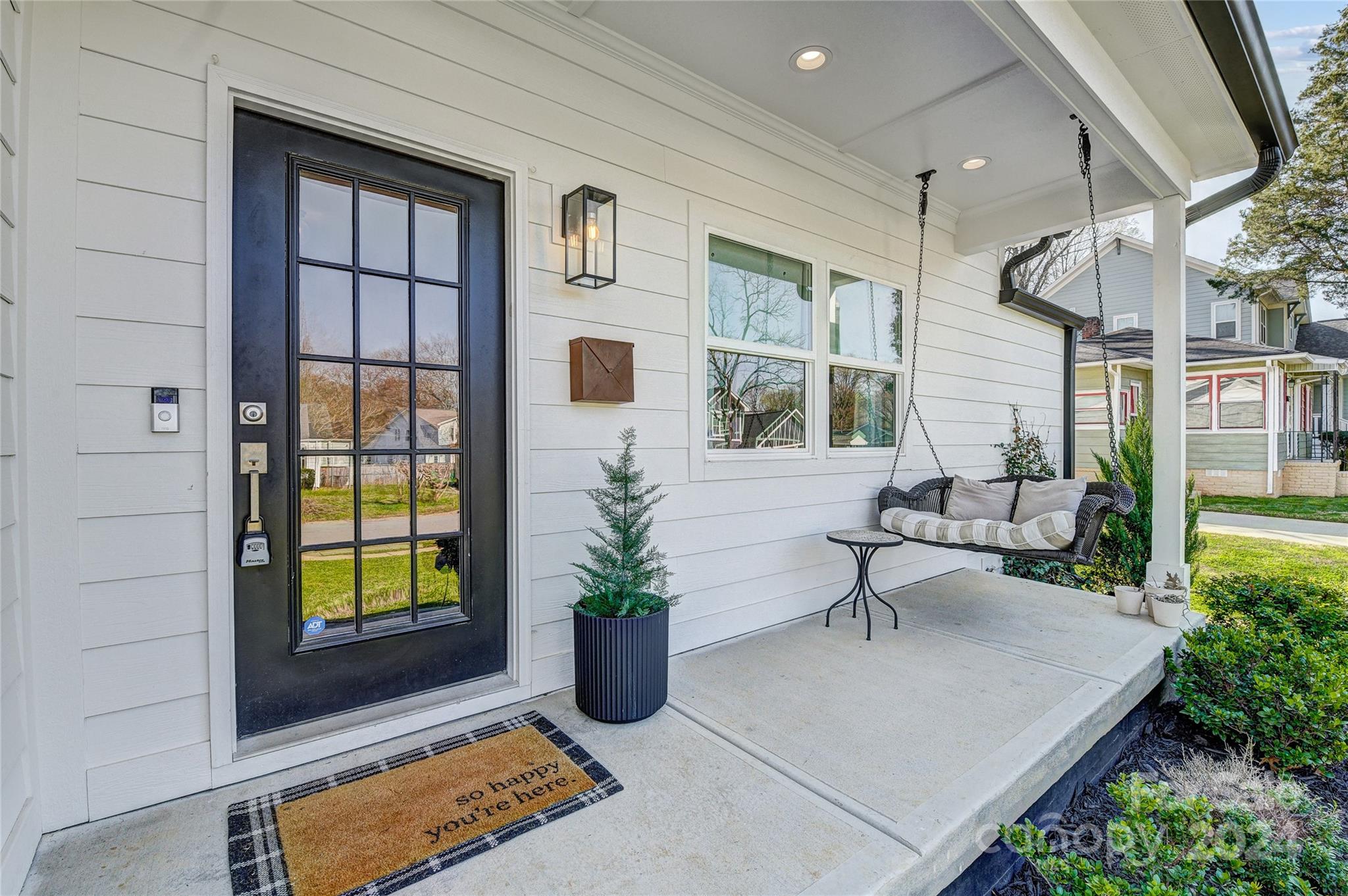 526 Seldon Drive Charlotte, NC 28216 - Photo 3 of 46 a living room with furniture and a potted plant