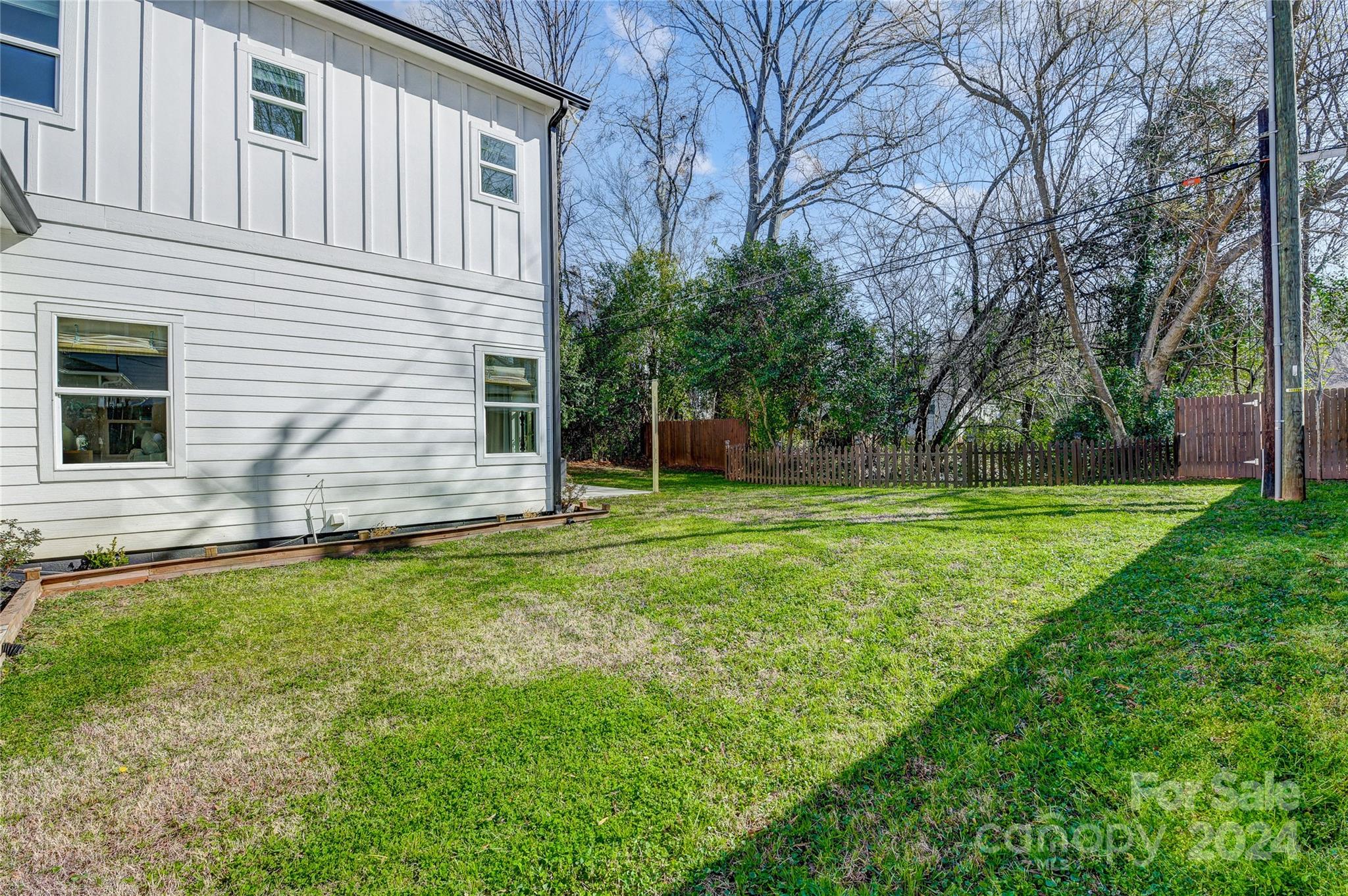 526 Seldon Drive Charlotte, NC 28216 - Photo 46 of 46 a view of a house with backyard and trees