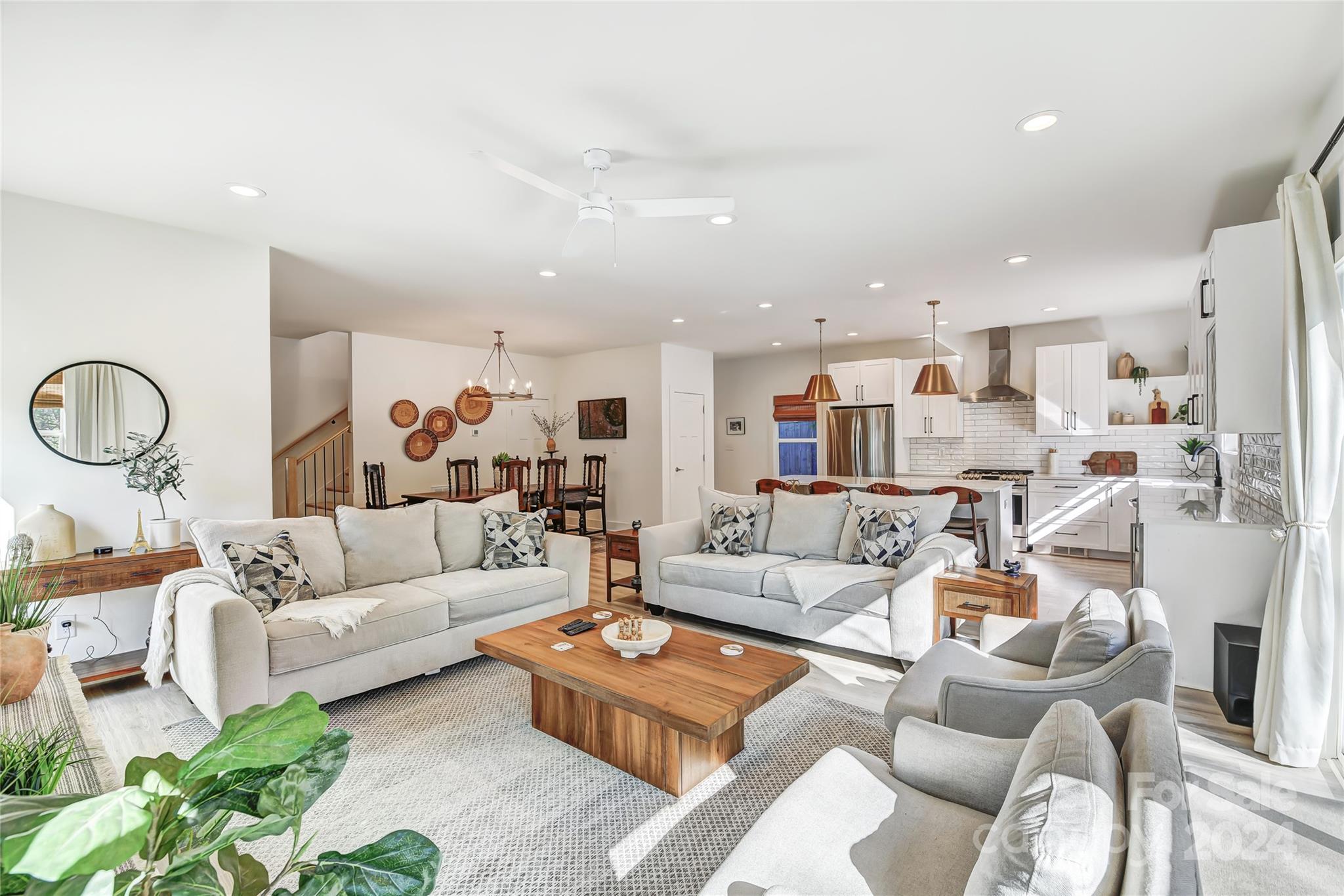 526 Seldon Drive Charlotte, NC 28216 - Photo 9 of 46 a living room with furniture kitchen view and a refrigerator