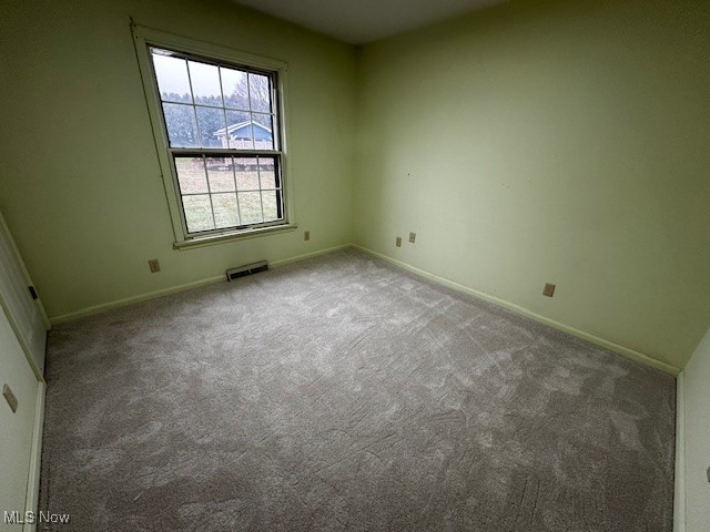3508 Miller Road Sandusky, OH 44870 - Photo 22 of 30 Spare room featuring carpet floors and baseboards