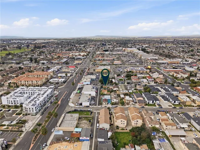 a view of a street with a building in the background