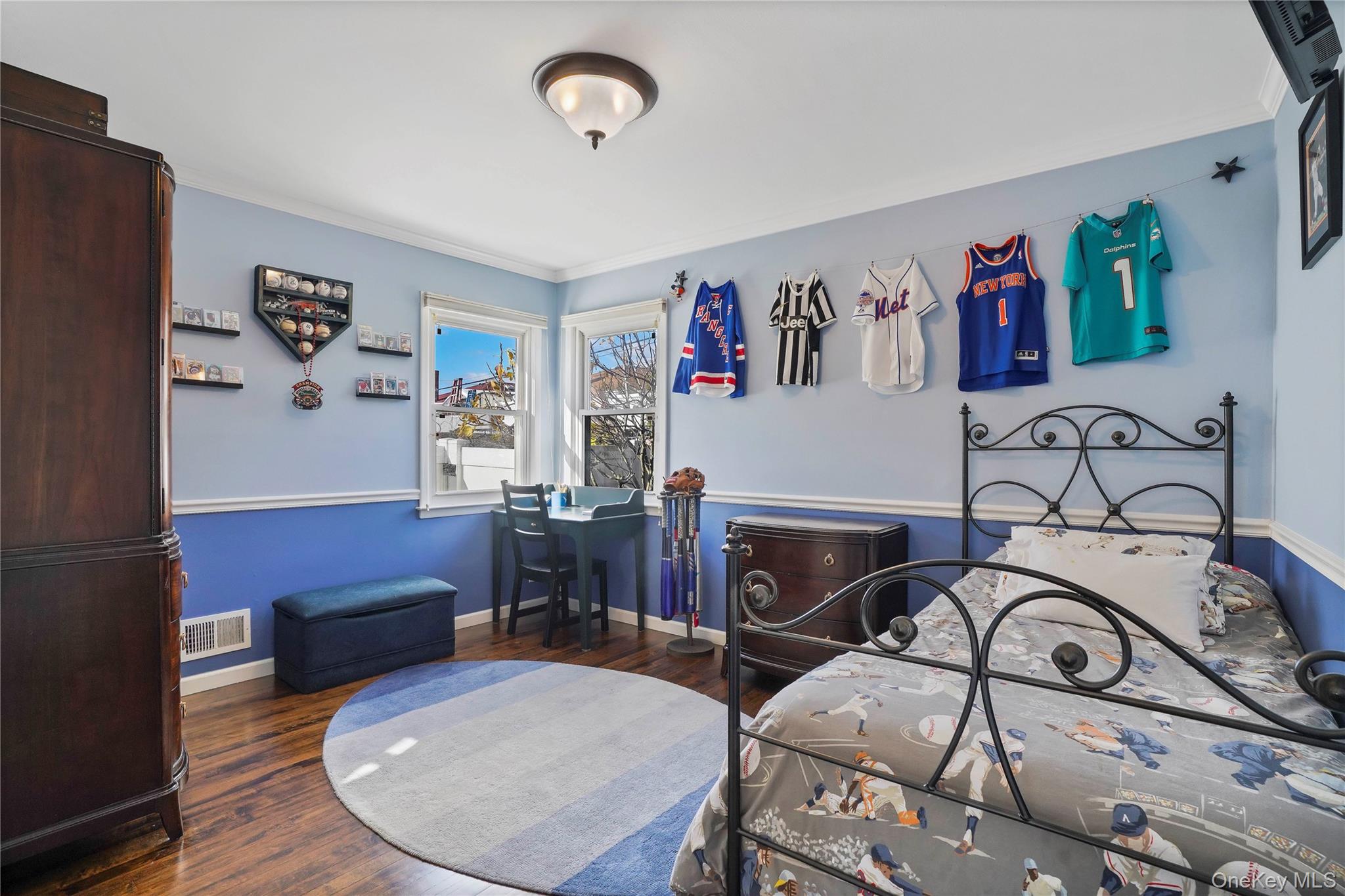 91-03 156th Avenue Queens, NY 11414 - Photo 19 of 50 Bedroom featuring ornamental molding and dark wood-style flooring