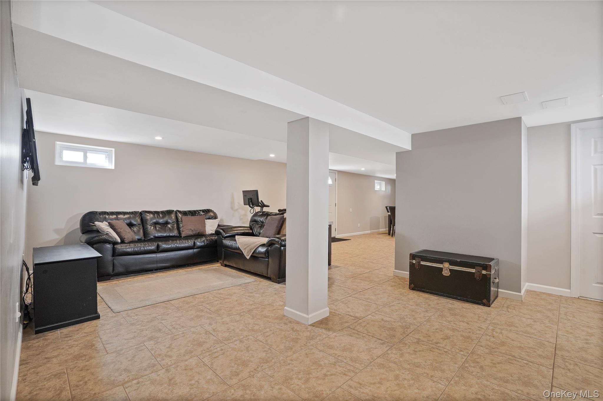 91-03 156th Avenue Queens, NY 11414 - Photo 27 of 50 Living area featuring recessed lighting and light tile patterned floors