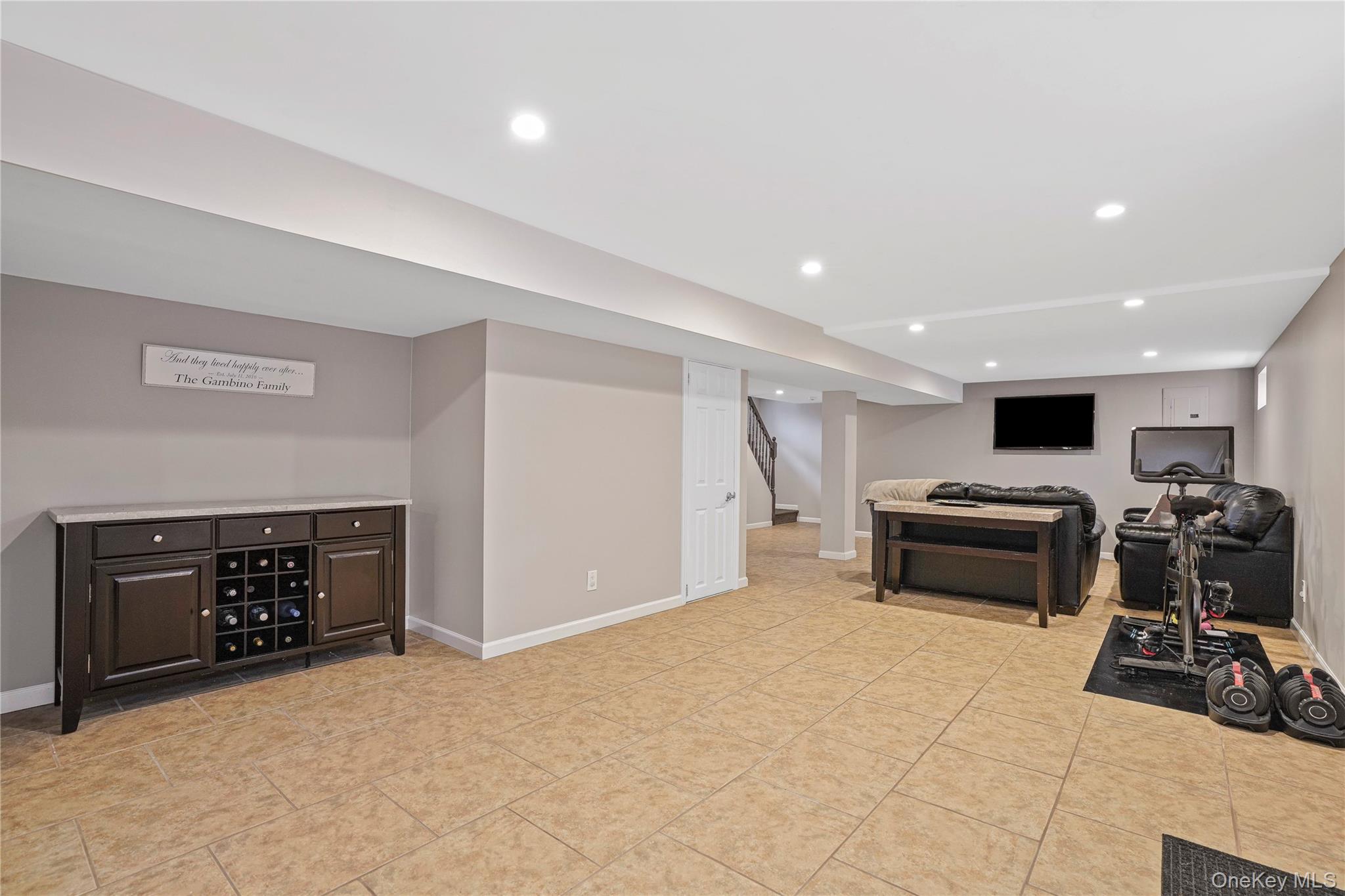 91-03 156th Avenue Queens, NY 11414 - Photo 33 of 50 Workout area featuring recessed lighting and light tile patterned floors