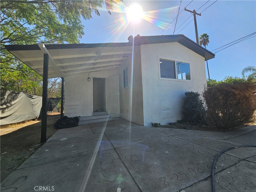 207-207 East O Street Colton, CA 92324 - Photo 19 of 26 a view of a house with a street