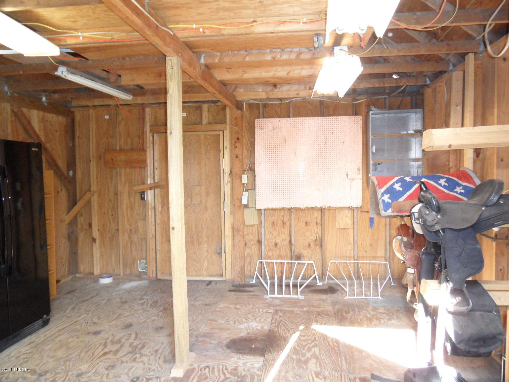 2873 Eagle Point Road Middleburg, FL 32068 - Photo 41 of 50 Inside of tack room